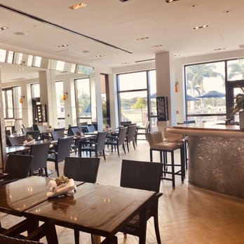 501 East - a dining area with tables and chairs - New American Near Me - Boca Raton, Florida 501 East - a dining area with tables and chairs - New American Near Me - Boca Raton, Florida