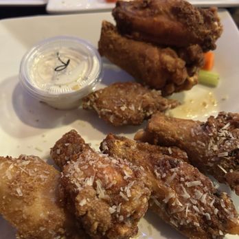 Kocky's Bar and Grill - Garlic parm wings and a few plain mixed in - Chicken Wings Near Me - Fresno, California Kocky's Bar and Grill - Garlic parm wings and a few plain mixed in - Chicken Wings Near Me - Fresno, California