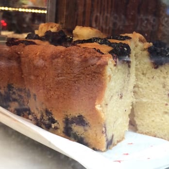 Eli's Essentials and Wine Bar - This pound cake looks like blueberry. Look how big the slice is! 8/11/26 - Cafes Near Me - New York, New York
