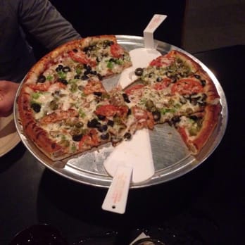 Rocky's Corner - Large deep dish vegetarian pizza. - Italian Near Me - Hot Springs, Arkansas