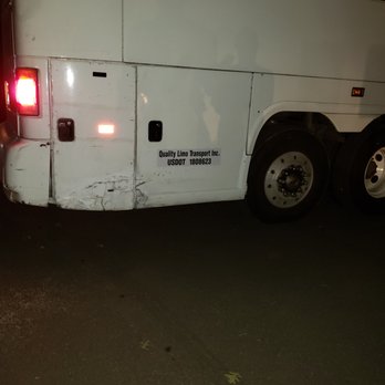 United Bus Charter - Photo shows damage to bus caused by driver's incompetence. After hitting a fence, she was unable to    maneuver bus in reverse. - Buses Near Me United Bus Charter - Photo shows damage to bus caused by driver's incompetence. After hitting a fence, she was unable to    maneuver bus in reverse. - Buses Near Me