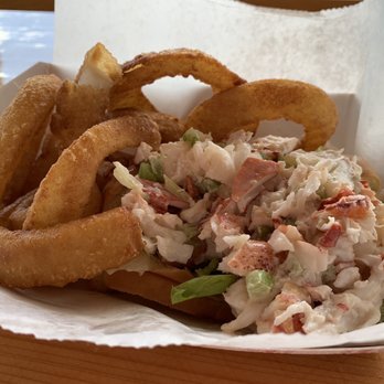 Champlin's Seafood - Lobster roll with onion rings - Seafood Near Me - Narragansett, Rhode Island Champlin's Seafood - Lobster roll with onion rings - Seafood Near Me - Narragansett, Rhode Island