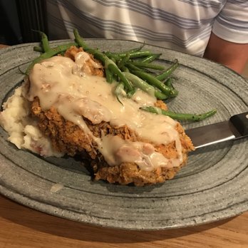 The Yard - COUNTRY FRIED STEAK - pounded angus ribeye, (bland) smashed potatoes, garlic green beans, bacon pepper gravy - Sports Bars Near Me - McKinney, Texas