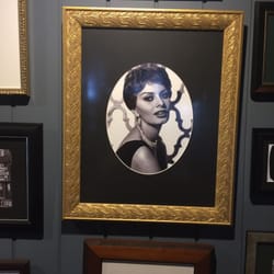 The Sicilian - Portraits line the walls