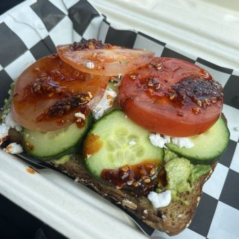 Birch Cafe - Avocado toast w/cucumber, feta, tomato and chili oil (ordered the first visit to the cafe). Pretty tasty, should use less flimsy bread. - Vegan Near Me - Highland Heights, Ohio Birch Cafe - Avocado toast w/cucumber, feta, tomato and chili oil (ordered the first visit to the cafe). Pretty tasty, should use less flimsy bread. - Vegan Near Me - Highland Heights, Ohio