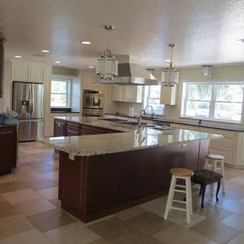 Maddox Construction Services - a kitchen with a center island - General Contractors Near Me Maddox Construction Services - a kitchen with a center island - General Contractors Near Me