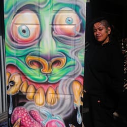 Fillmore Tattoo - Custom air brushing on interior door by P.C. Zavala.