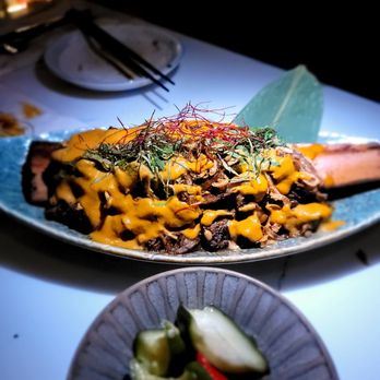 Nemesis - Padang Beef Ribs ($46.) Massive. Tender. Tasty but a bit fatty. I'd split it - Tapas/Small Plates Near Me - New York, New York Nemesis - Padang Beef Ribs ($46.) Massive. Tender. Tasty but a bit fatty. I'd split it - Tapas/Small Plates Near Me - New York, New York