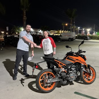 Malcolm Smith MotorSports - Brian and my husband with his new KTM DUKE 200 - Motorcycle Dealers Near Me - Riverside, California Malcolm Smith MotorSports - Brian and my husband with his new KTM DUKE 200 - Motorcycle Dealers Near Me - Riverside, California