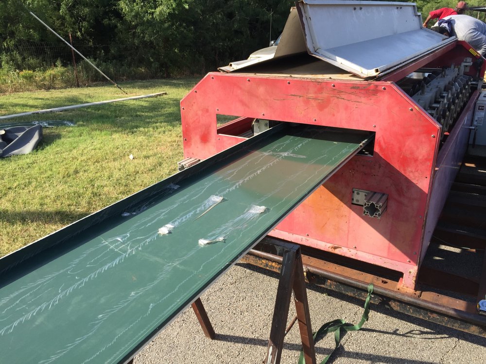 Slide of Roofing Giant