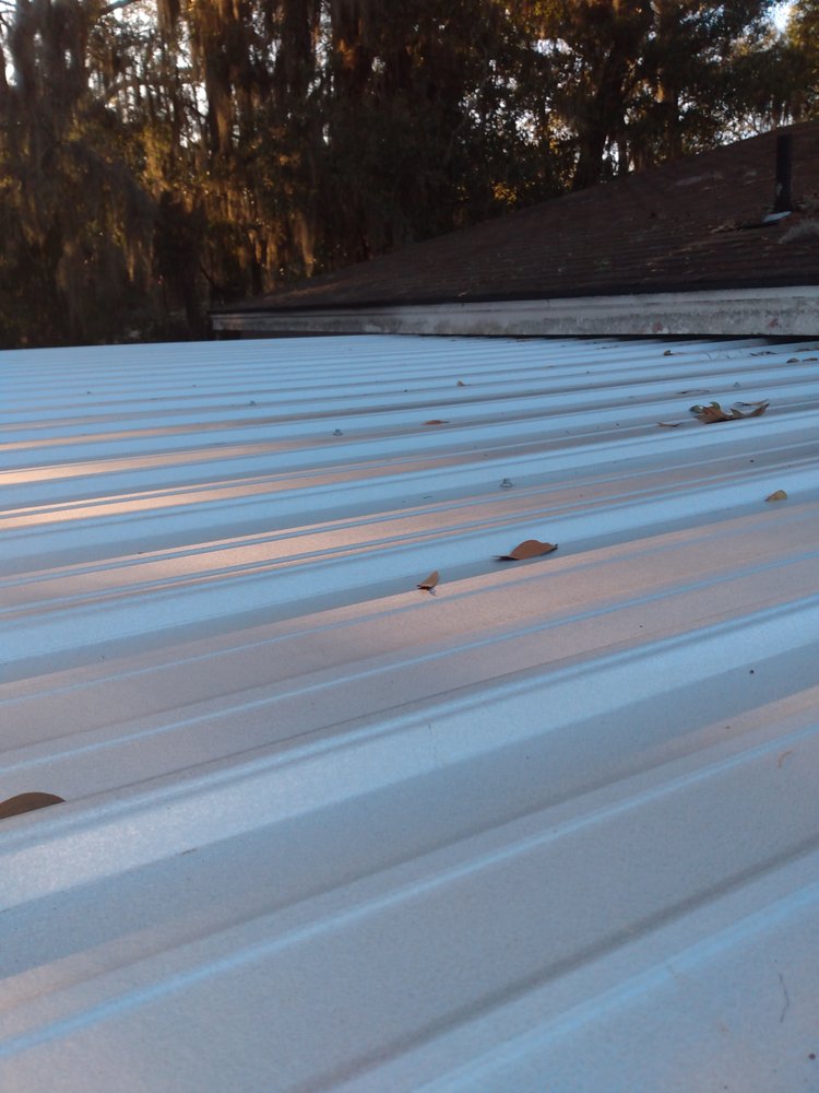 Slide of UnZucky Roofing