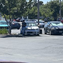 Pure Nails Bar - Manager loves to sit on other people's cars in the parking lot instead of his own.