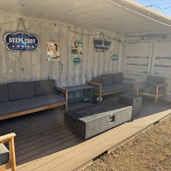 Picture of several of the outdoor shelters near the picnic tables and games!