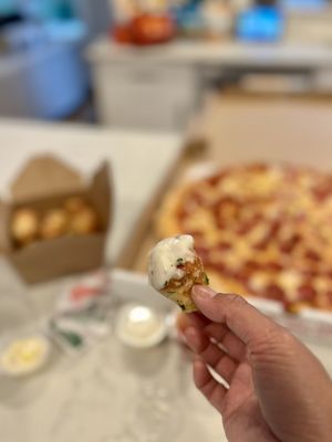 Photo of Society Pie - Beaverton, OR, US. Freshly made garlic knots dipped into Alfredo sauce!