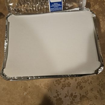 Gina's Pizzeria - Looks big in the picture but it's the size of the water bottle. - Pizza Near Me - Montebello, California