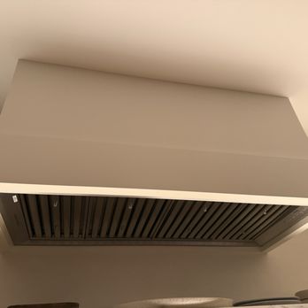 Inner Harbor Woodworking - Underside of the range hood cover - Carpenters Near Me Inner Harbor Woodworking - Underside of the range hood cover - Carpenters Near Me