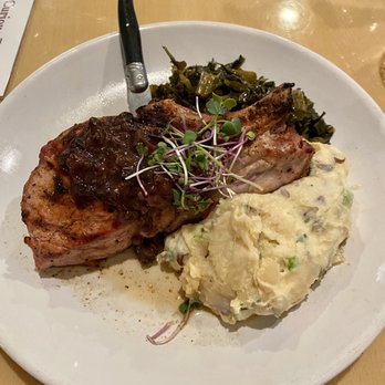 The Curious Pig - $27 Pork Chop w/ jam, collards (so good) & pimento mashed potato. Pork chop is AMZING! Semi-fatty with amazing flavor. Cooked perfectly! - Gastropubs Near Me - Peachtree City, Georgia The Curious Pig - $27 Pork Chop w/ jam, collards (so good) & pimento mashed potato. Pork chop is AMZING! Semi-fatty with amazing flavor. Cooked perfectly! - Gastropubs Near Me - Peachtree City, Georgia