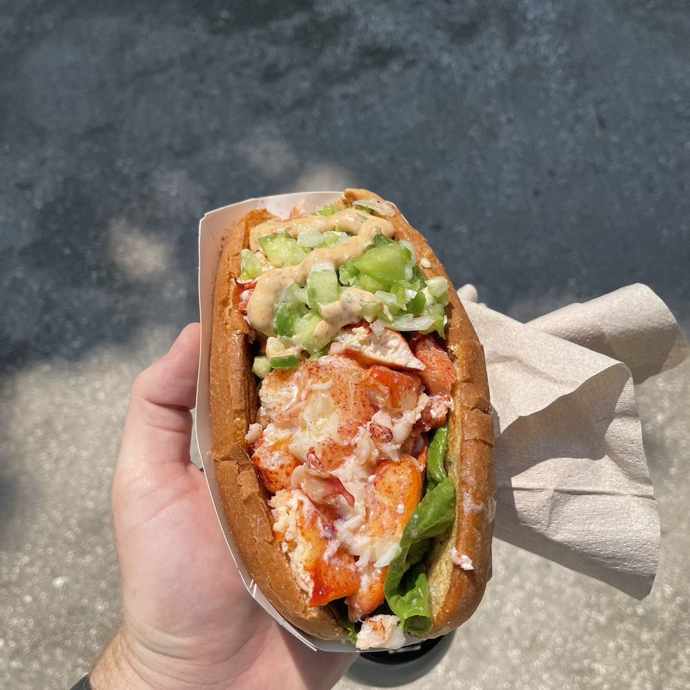 Jumbo Lobster roll, half regular half spicy Jumbo Lobster roll, half regular half spicy