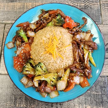 Pizzanada - a plate of food with rice and vegetables - Empanadas Near Me - Bloomfield, New Jersey Pizzanada - a plate of food with rice and vegetables - Empanadas Near Me - Bloomfield, New Jersey