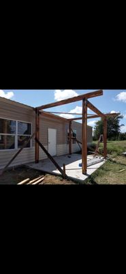 custom Cedar awning installation - We were recently commissioned to execute a bespoke architectural enhancement: the design and construction of a custom cedar awning. This project centered on meeting the client's explicit vision for a high-quality aesthetic while ensuring flawless structural integrity. A critical element of this build involved meticulously addressing the integration of the awning with the existing residential structure. Our team successfully engineered a seamless and durable connection, resulting in a visually appealing, functional outdoor element that significantly elevates the home's curb appeal and provides lasting protection. The final outcome speaks to our commitment to precision craftsmanship and tailored client satisfaction. custom Cedar awning installation - We were recently commissioned to execute a bespoke architectural enhancement: the design and construction of a custom cedar awning. This project centered on meeting the client's explicit vision for a high-quality aesthetic while ensuring flawless structural integrity. A critical element of this build involved meticulously addressing the integration of the awning with the existing residential structure. Our team successfully engineered a seamless and durable connection, resulting in a visually appealing, functional outdoor element that significantly elevates the home's curb appeal and provides lasting protection. The final outcome speaks to our commitment to precision craftsmanship and tailored client satisfaction.