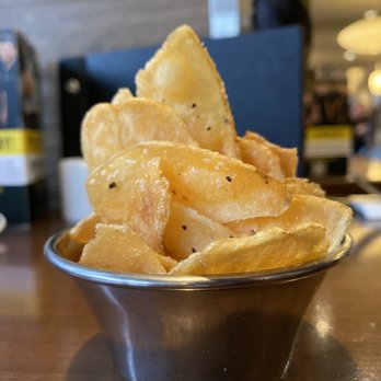 Bin 4 Burger Lounge - a bowl of potato chips - Burgers Near Me - Vancouver, British Columbia
