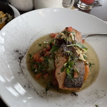 Splashes Restaurant - Salmon-artichoke with tomato's - New American Near Me - Laguna Beach, California Splashes Restaurant - Salmon-artichoke with tomato's - New American Near Me - Laguna Beach, California