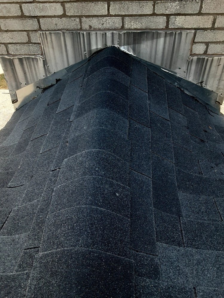 Slide of Leo's S & S Roofing