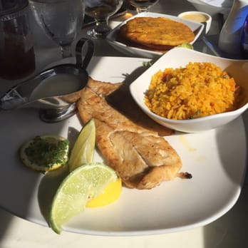 Casablanca - Delicious, grilled, and well seasoned snapper filet with tasty yellow rice and fried tostones. - Seafood Near Me - Miami, Florida