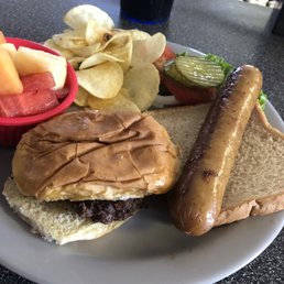 "Lunch special"  An experience, complete with overdone, crispy hamburger patty slid between two smashed halves of a bun and brat on bread.