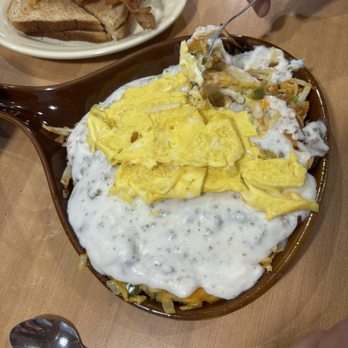 Cornerstone Family Restaurant - Breakfast bowl with scrambled eggs, sausage gravy, peppers, hash browns and your choice of meat. - New American Near Me - Eureka, Illinois