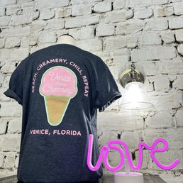 a t - shirt on a table a t - shirt on a table