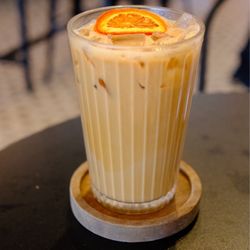 Tamper Room Cafe & Gallery - Orange cardigan coffee