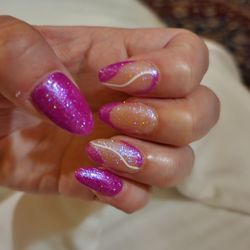 Monica Nails & Hair Salon - I used a picture picture for the design and manicurist redid the design a few times to make sure it's perfect.