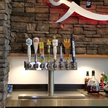 Rodizio Grill - Beer taps behind bar - Brazilian Near Me - Henderson, Nevada Rodizio Grill - Beer taps behind bar - Brazilian Near Me - Henderson, Nevada