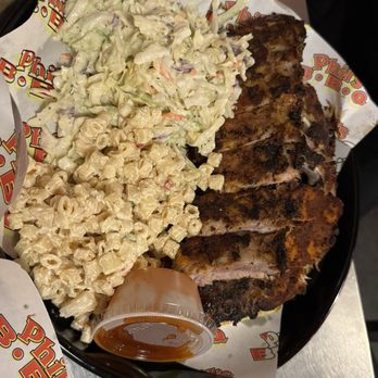 Phil's BBQ - Full rack of pork ribs with Mac salad and Cole slaw - Barbeque Near Me - San Diego, California Phil's BBQ - Full rack of pork ribs with Mac salad and Cole slaw - Barbeque Near Me - San Diego, California