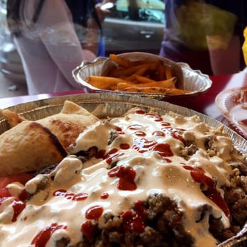The Halal Guys - Deliciousness. Regular platter of chicken and gyro topped with the famous white and hot sauce. Side of fries - Middle Eastern Near Me - Chicago, Illinois The Halal Guys - Deliciousness. Regular platter of chicken and gyro topped with the famous white and hot sauce. Side of fries - Middle Eastern Near Me - Chicago, Illinois