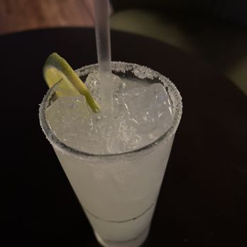 Lazy Fish - a margarita in a glass with a lime wedge - Lounges Near Me - Honolulu, Hawaii