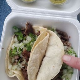Carne asada (beef/steak) street tacos.