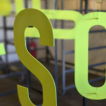 Static Custom Coatings - drying steel letters - Powder Coating Near Me - Phoenix, Arizona Static Custom Coatings - drying steel letters - Powder Coating Near Me - Phoenix, Arizona