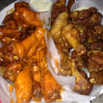 Holties Restaurant & Pub - 48 wings: half spicy, half lemon pepper - American Near Me - Barnhart, Missouri