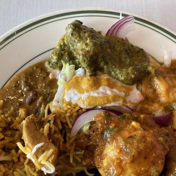 Minerva - a plate of food with rice and meat - Indian Near Me - Gaithersburg, Maryland Minerva - a plate of food with rice and meat - Indian Near Me - Gaithersburg, Maryland