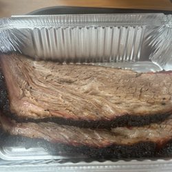 The Pit Stop BBQ - 1/2 lb of the best brisket you will ever try .