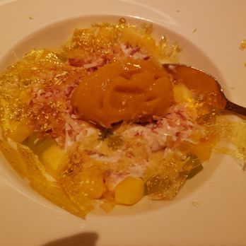 Wing Lei - Coconut Lemongrass Rice Pudding, with the thin layer of crispy sugar broken - Chinese Near Me - Las Vegas, Nevada Wing Lei - Coconut Lemongrass Rice Pudding, with the thin layer of crispy sugar broken - Chinese Near Me - Las Vegas, Nevada