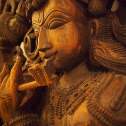 WellNest Studios Fitness & Wellness - 8' Wood Carved Statue of Krishna in Yoga Studio