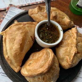 Buenos Aires Café - Este - Empanadas - clockwise from the top: pollo, carne picante, atún, cebolla y queso - Argentine Near Me - Austin, Texas Buenos Aires Café - Este - Empanadas - clockwise from the top: pollo, carne picante, atún, cebolla y queso - Argentine Near Me - Austin, Texas