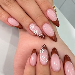 Bliss Nails & Spa - Gel-X nails with BUBLE BATH and brown French tips and delicate nail art for a feminine, elegant look.