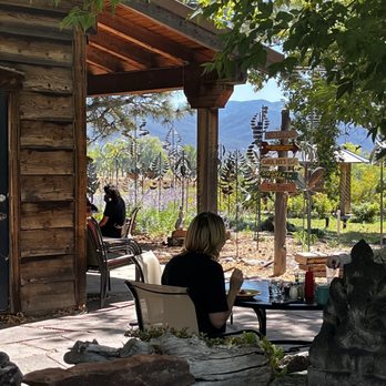 Farmhouse Cafe and Bakery - Patrons enjoy their moment with a great mountain view - Cafes Near Me - Taos, New Mexico