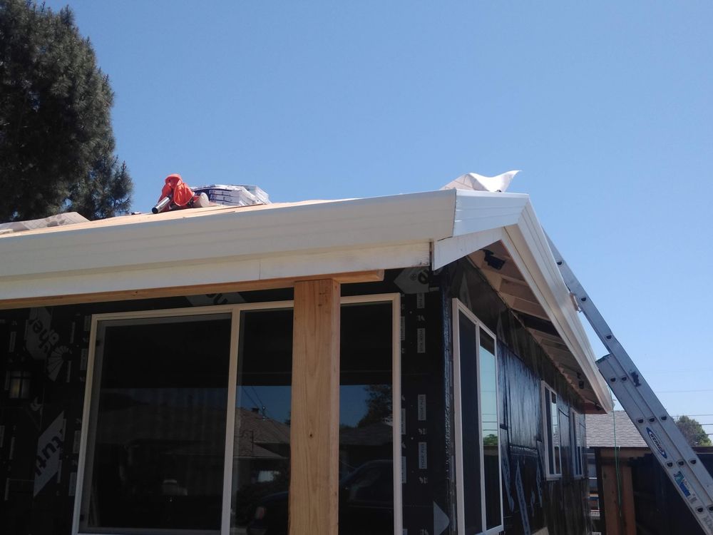 Slide of JB Rain Gutter installation