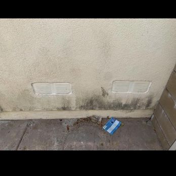 Pressurized Cleaning Solutions - Dirty wall and ground - Pressure Washers Near Me