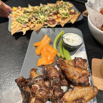 PopStroke - garlic parm grilled wings - Mini Golf Near Me - Delray Beach, Florida PopStroke - garlic parm grilled wings - Mini Golf Near Me - Delray Beach, Florida